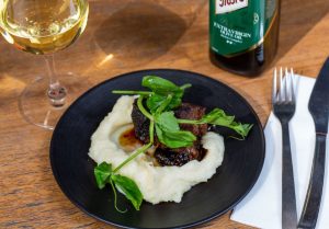 Slow-cooked beef cheek served over creamy potato mash with Moro Primero Extra Virgin Olive Oil