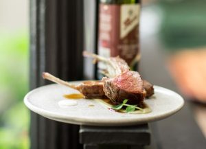 Marinated lamb rack served with creamy eggplant puree and Moro Intenso Extra Virgin Olive Oil